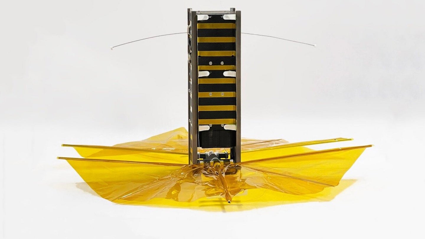 Cube satellite with Kapton drag sail