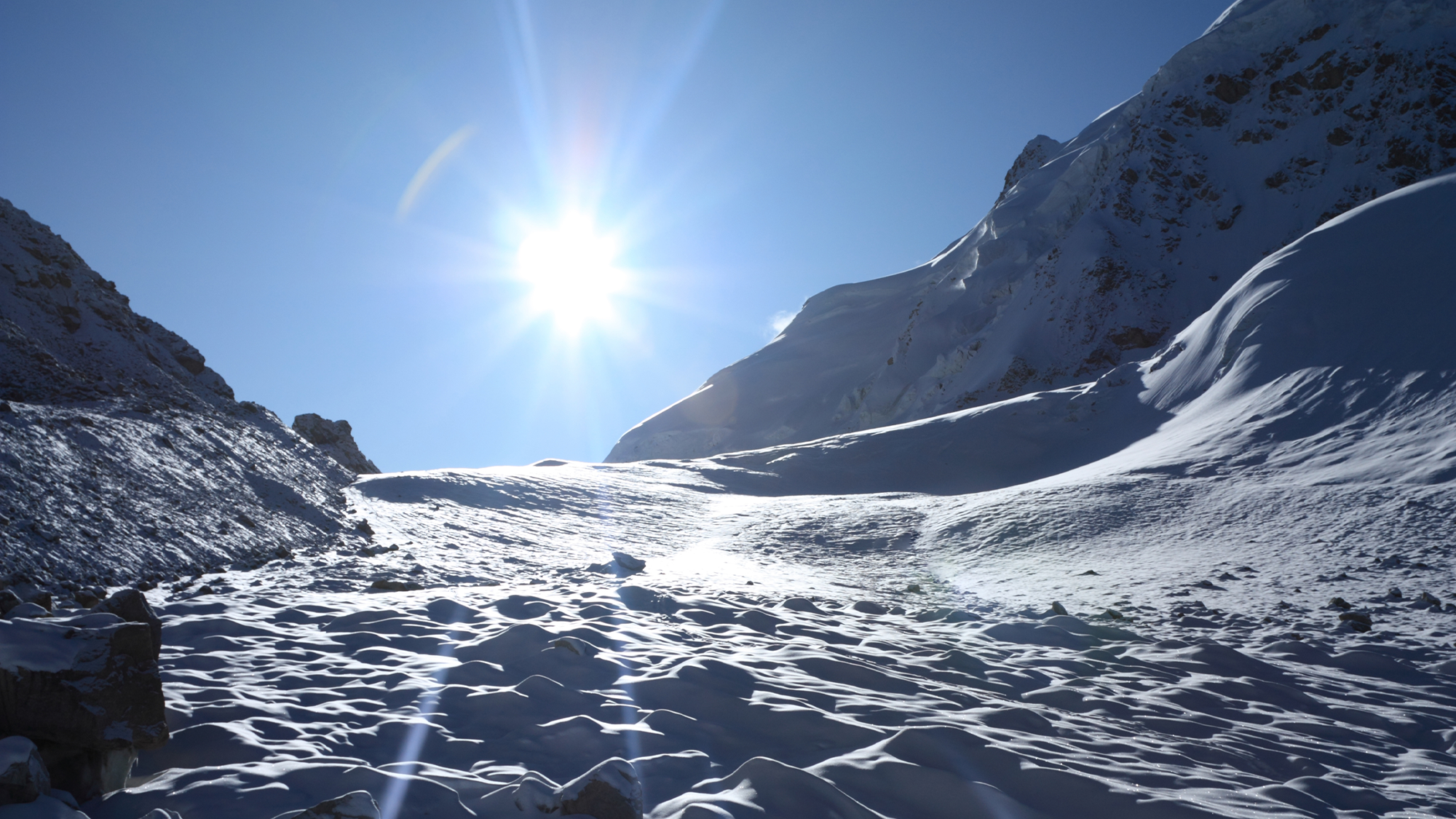 The sun shining on glaciers.