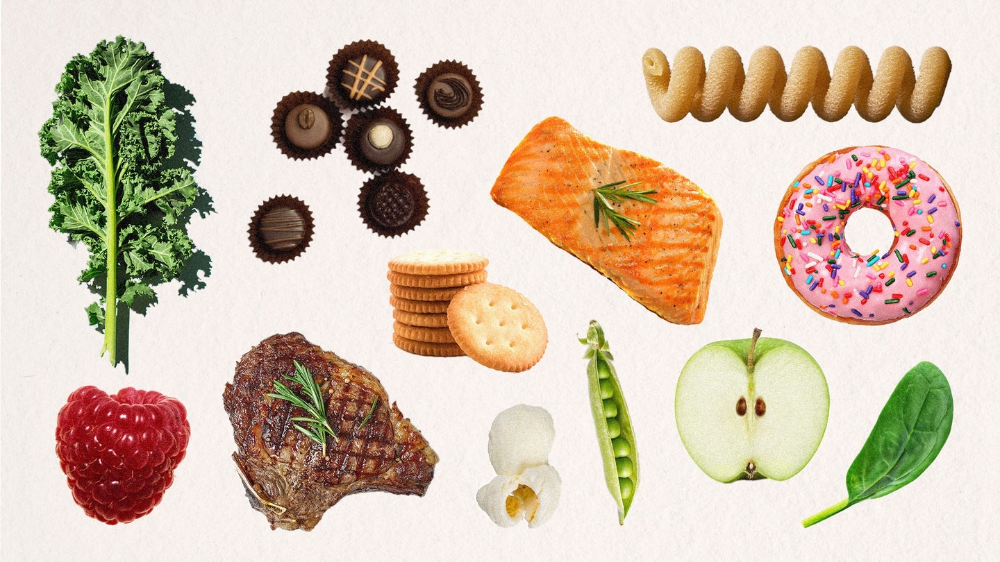 Foods that make you feel full on a beige background, including kale, raspberry, whole wheat pasta, salmon, green apple, steak, crackers, chocolates, popcorn, pink frosted donut, peas in a pod, and a basil leaf