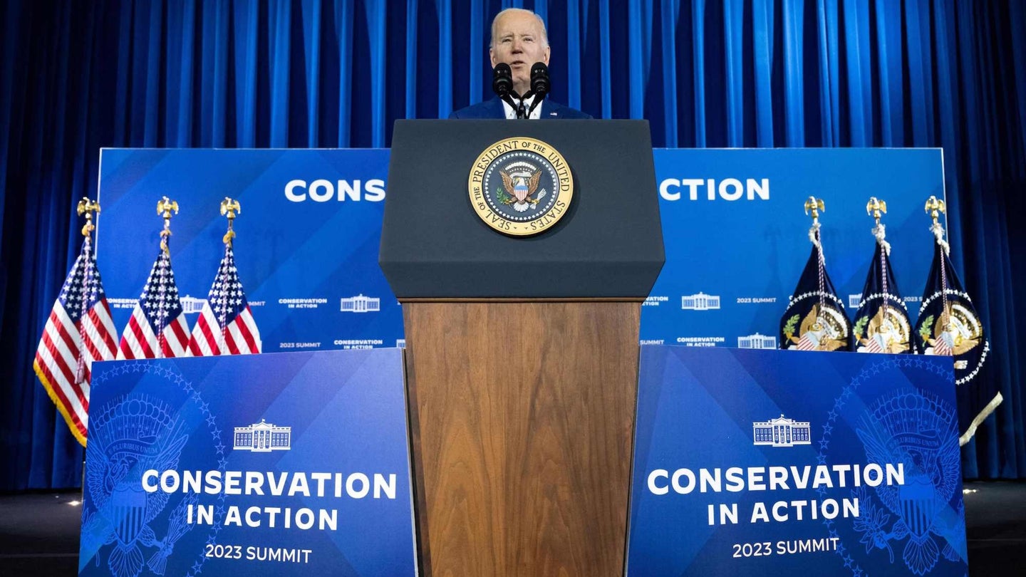 President Joe Biden standing at a podium, addressing the White House Conservation in Action Summit.