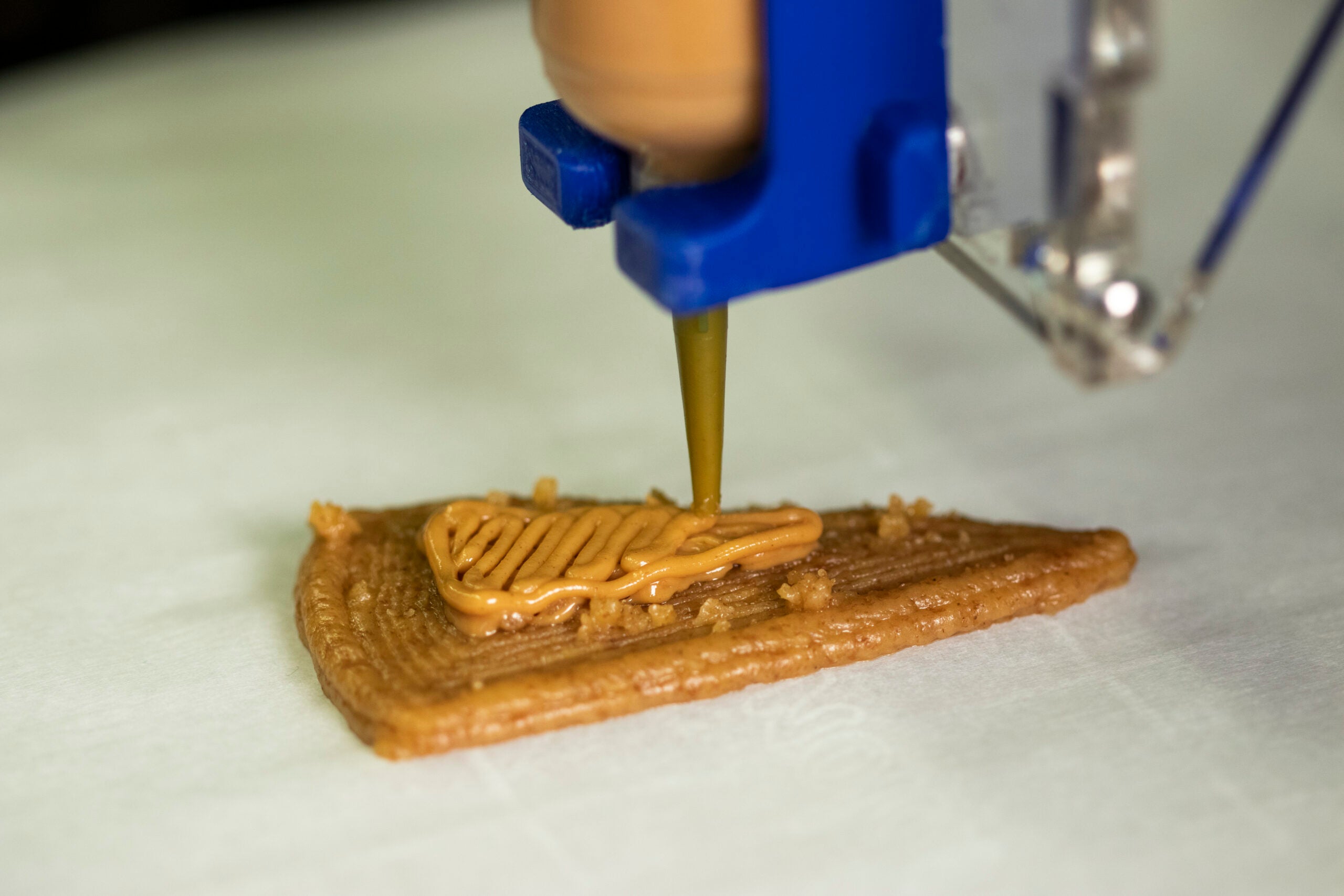 3D-printing layers of a cheesecake