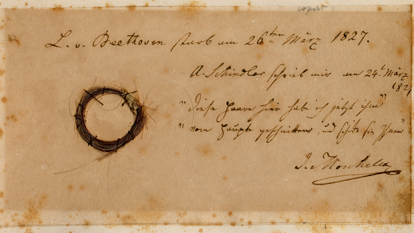 A curled lock of composer Ludwig van Beethoven's hair with an inscription from the hair's former owner, Ignaz Moscheles.
