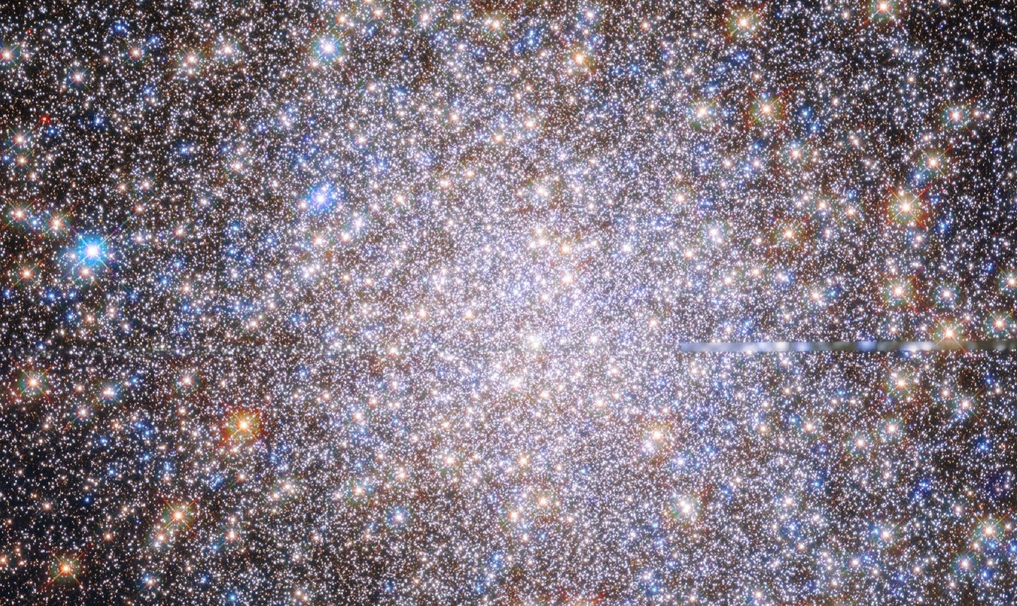 Colorful M19 star cluster in NASA Hubble Space Telescope image