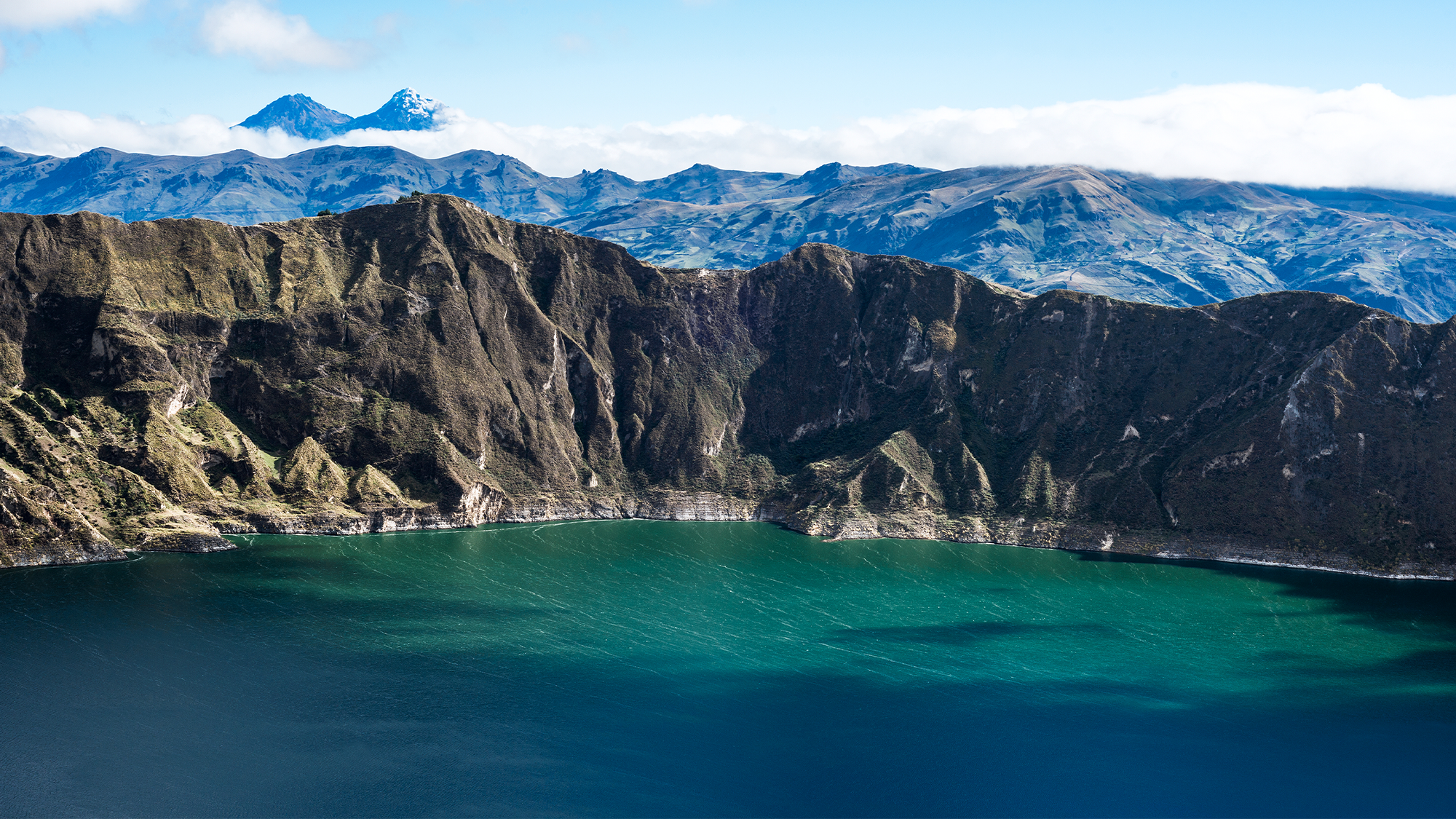 Ilinizas Volcanoes under the Quilotoa lagoon in the Andes Mountains in Ecuador. Scientists recently discovered two new carnivorous plant species in the rugged high Andes.