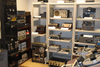 shelves with lots of old-style recording equipment