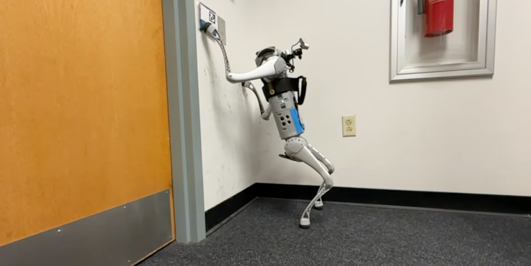 Watch this robotic dog use one of its ‘paws’ to open doors