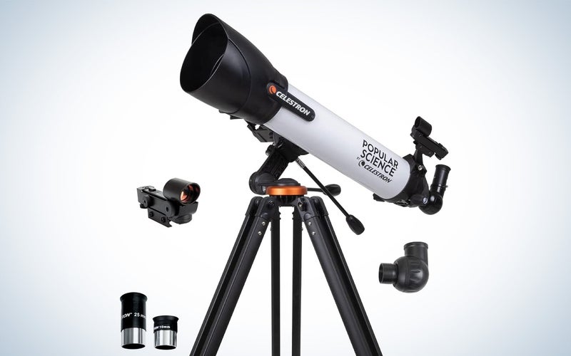 Celestron x PopSci telescope on a plain background with its accessories