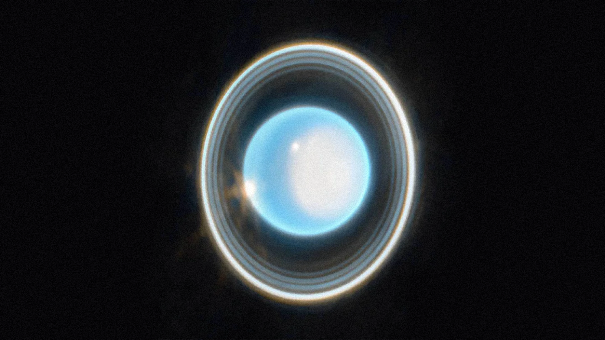Pale blue Uranus with clearly detailed rings captured by NASA's James Webb Space Telescope