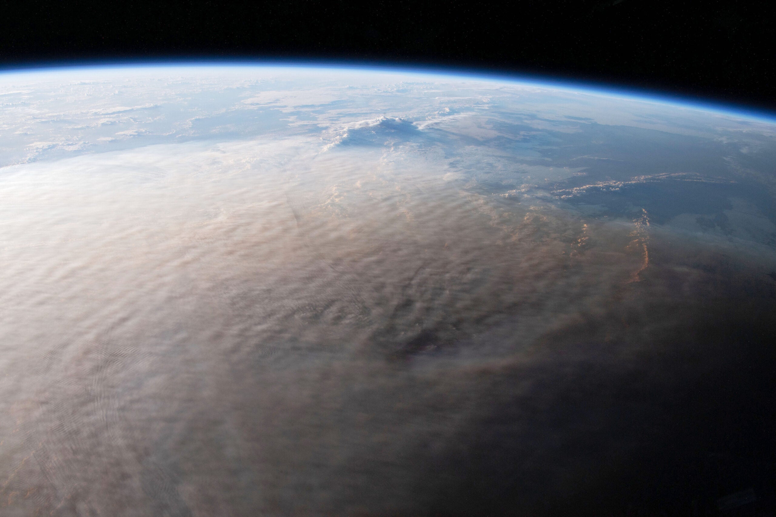 Ash cloud from Hunga-Tonga volcano over the Pacific ocean seen from space