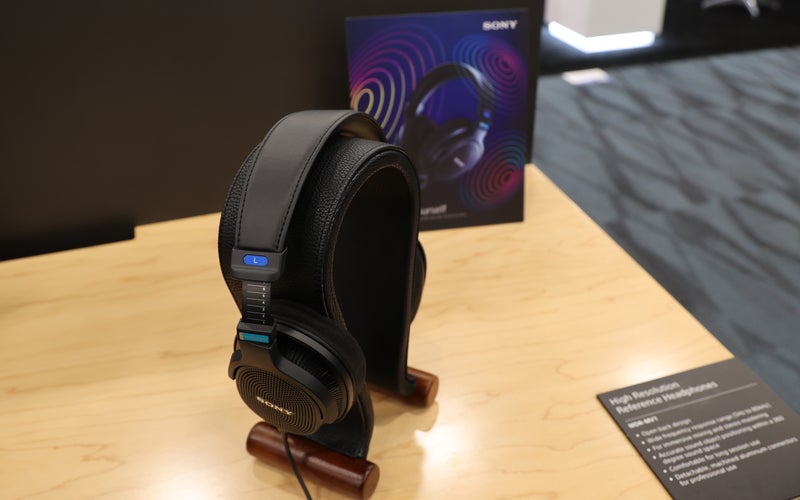 Sony MDR-MV1 headphones sitting on a table on a stand