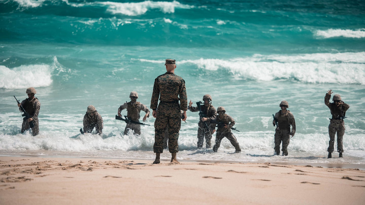 Marines during an exercise in Hawaii on April 10, 2023. The Terranaut robot, not pictured, is designed to cope with explosives in these kinds of environments.