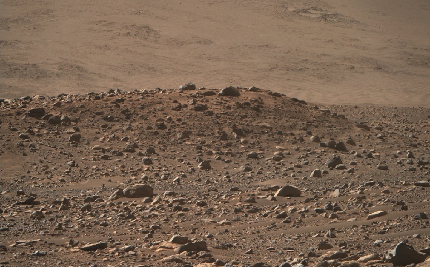 NASA Ingenuity helicopter lost in a Mars crater in a photo taken by Perseverance rover