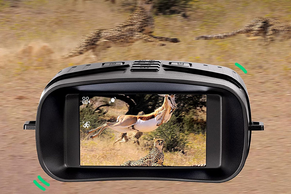A pair of digital binoculars looking at a deer.