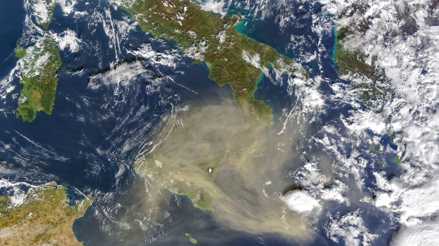 A swirl of dust from the Sahara desert is carried on winds above the Mediterranean.
