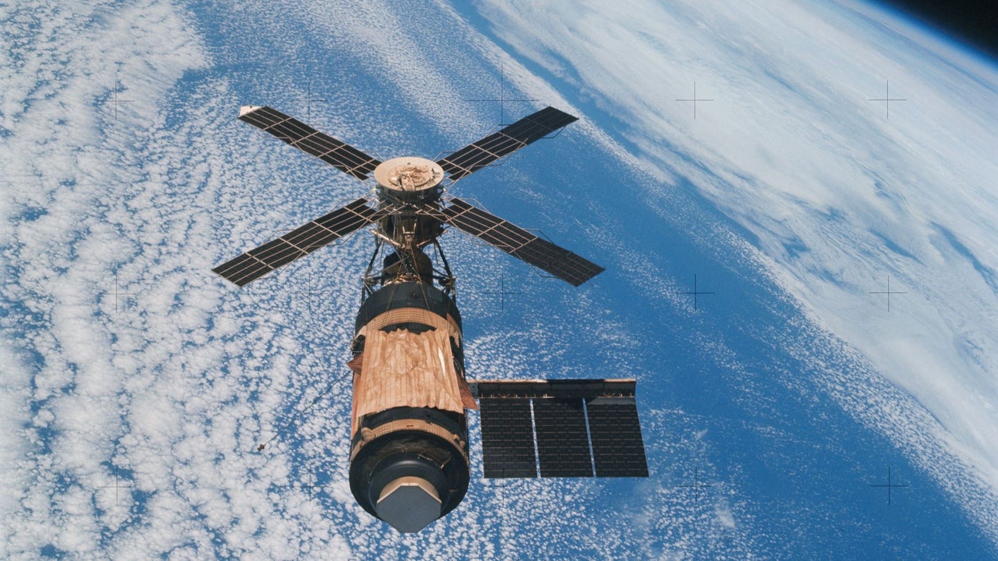 Skylab, America's first space station, orbits Earth.