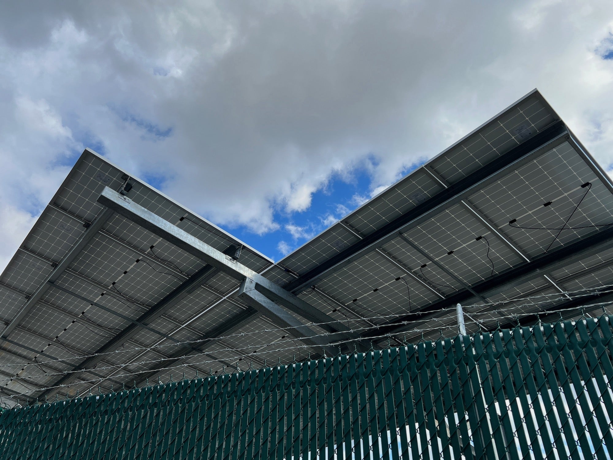 A very small amount of power can come from this solar canopy on site—a reminder that the cleanest energy comes from renewable sources.