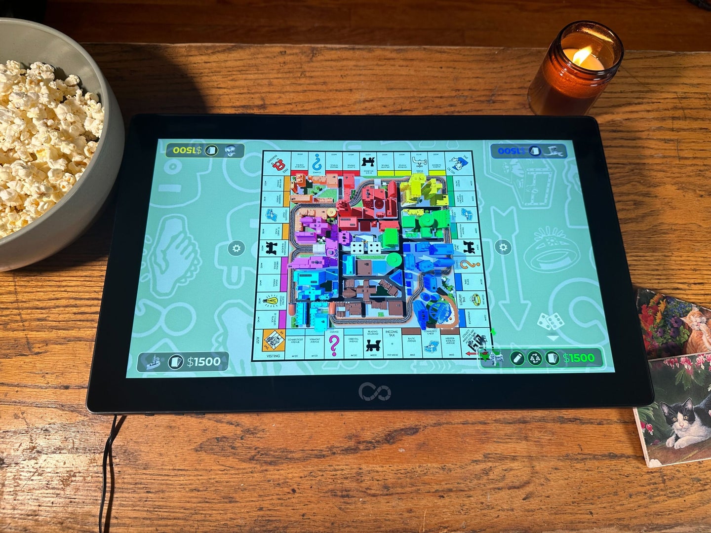 The Arcade 1up Infinity Game Board with Monopoly on the screen