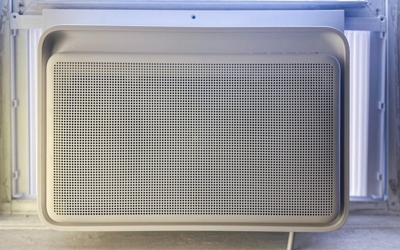 Windmill AC with WhisperTech in an apartment window (color-corrected header)