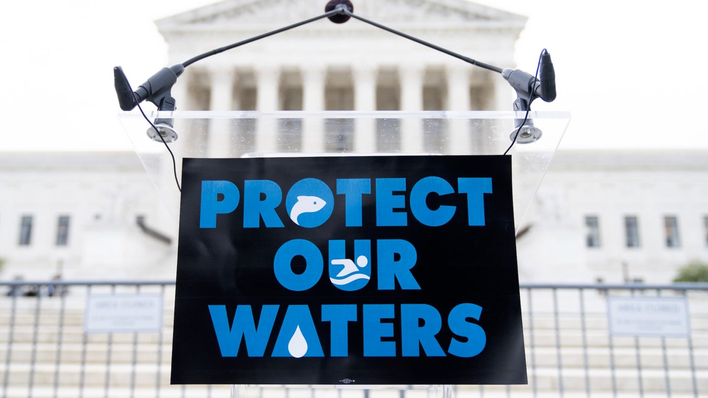 A sign that reads "Protect Our Waters" outside of the US Supreme Court before a rally to call for protection of the Clean Water Act on October 3, 2022. As the term began, the court was hearing arguments in the case of Sackett v. Environmental Protection Agency.