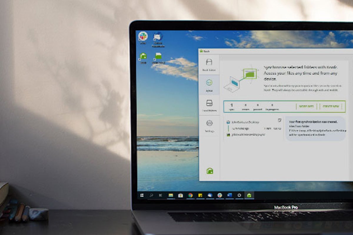 A laptop running a cloud storage service program