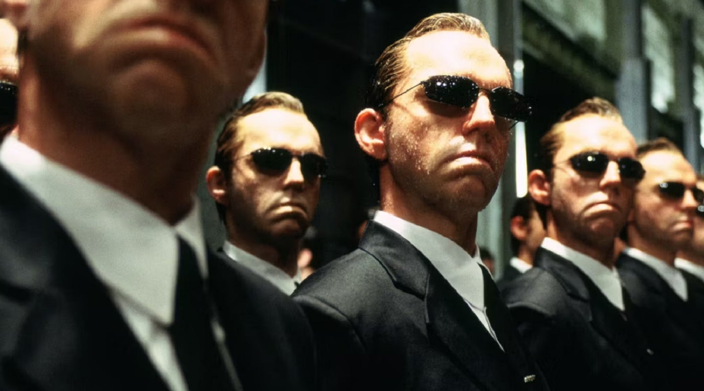 Agent Smith clones from The Matrix to show the concept of singularity in AI and AGI