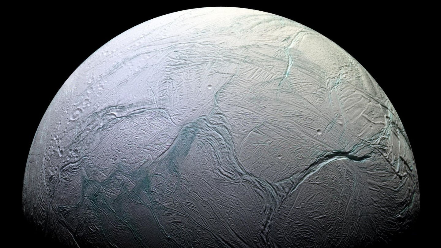 A mosaic of ocean world Enceladus, a geologically active moon of Saturn.