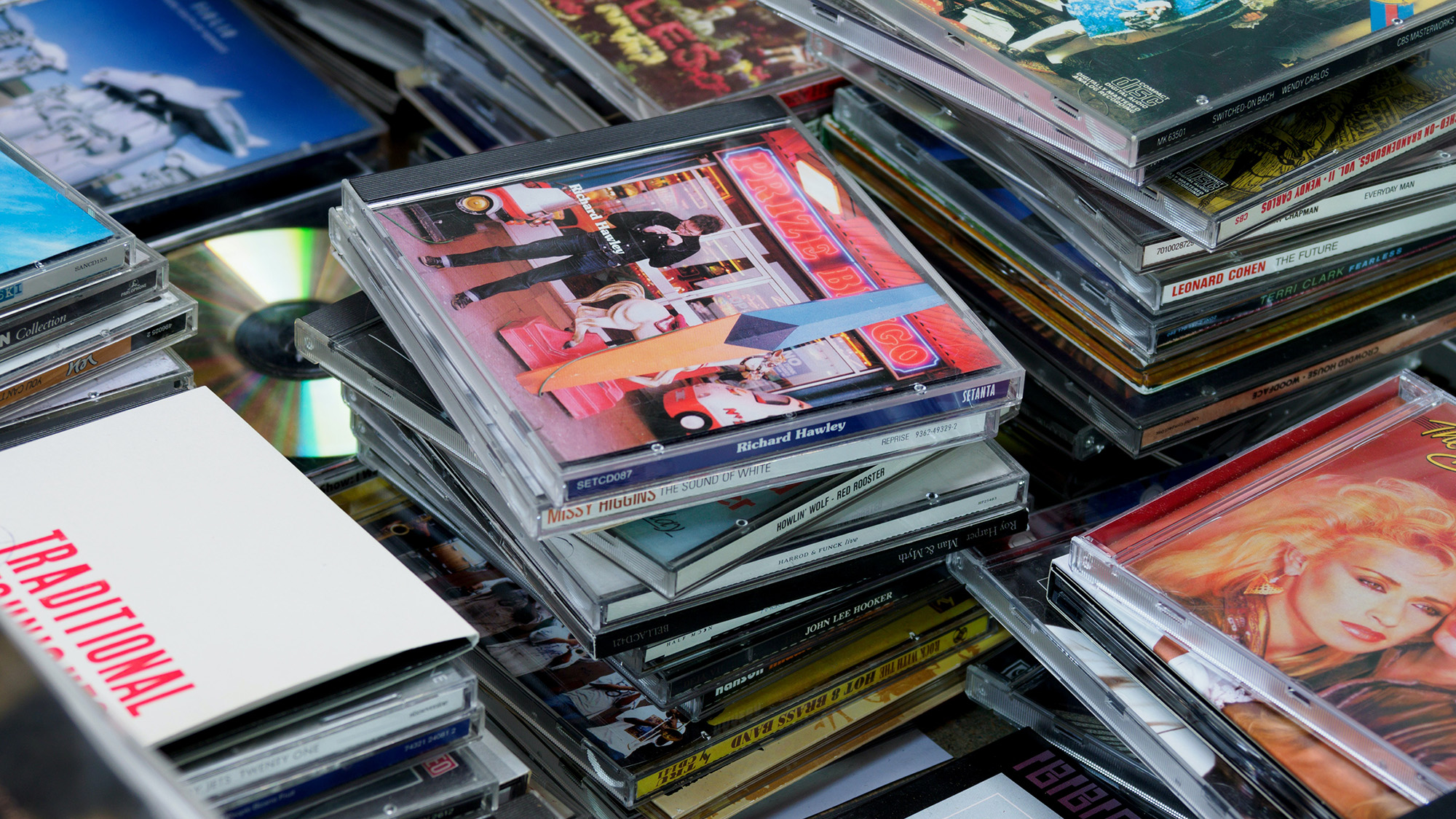Piles of music CDs