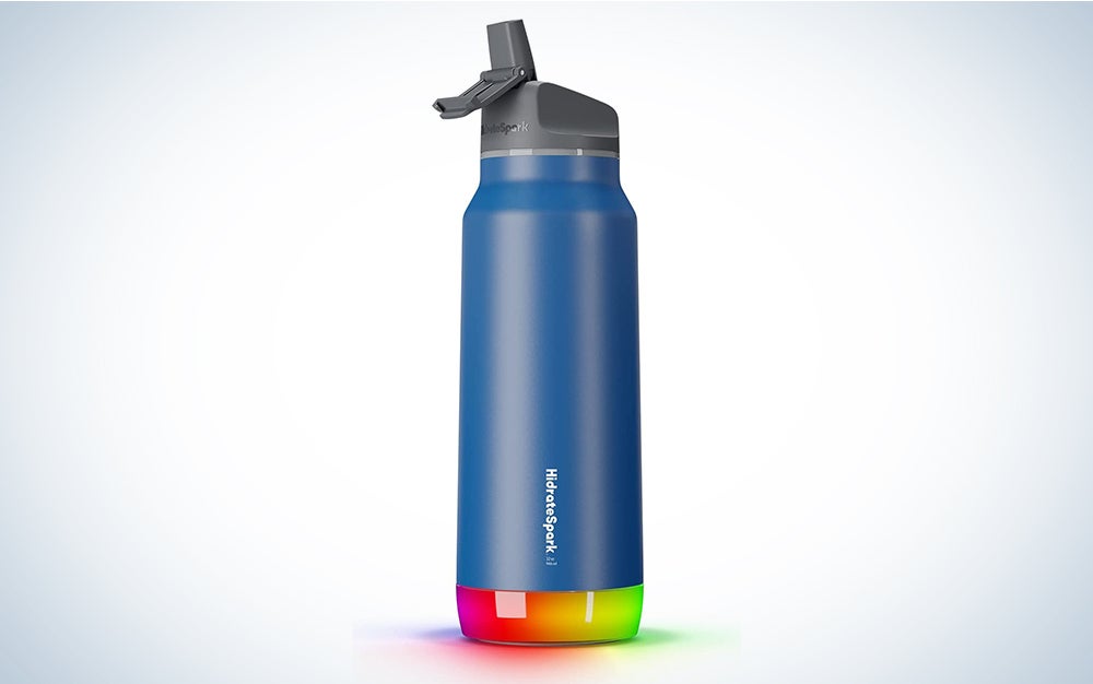 A blue HidrateSpark water bottle on a blue and white background