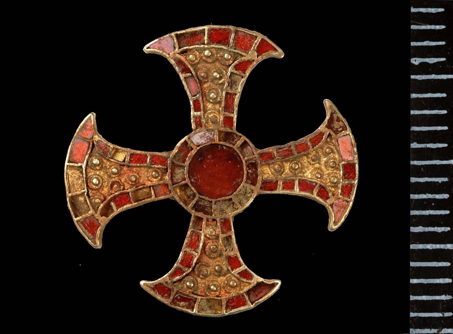 The Trumpington Cross, a cross made with gold and garnet stones.