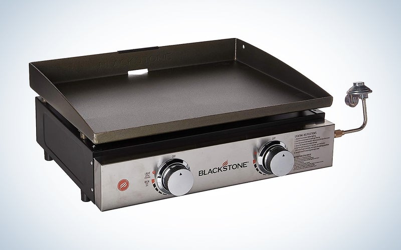 A Blackstone griddle on a blue and white background