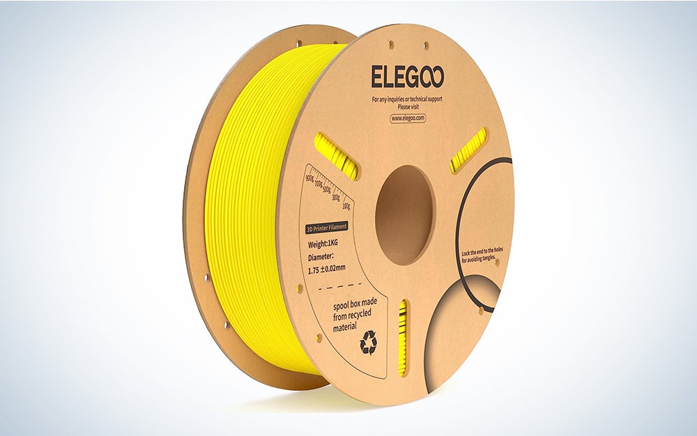 A spool of yellow Elegoo PLA+ Filament on a blue and white background