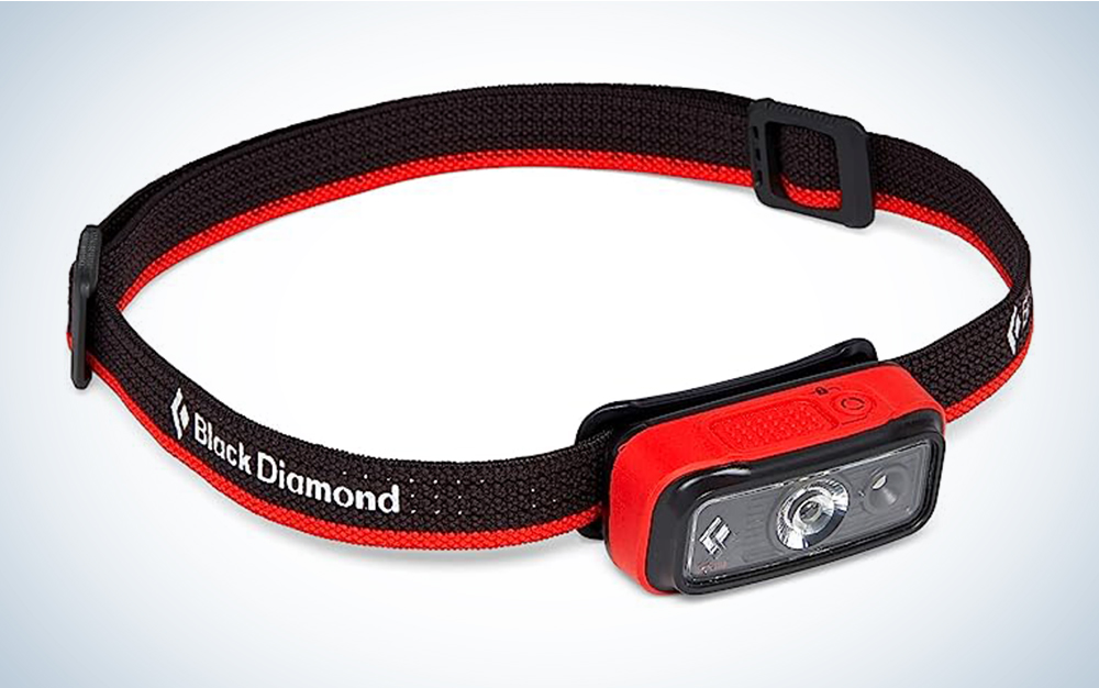 A red Black Diamond Spot 200 Headlamp on a blue and white background