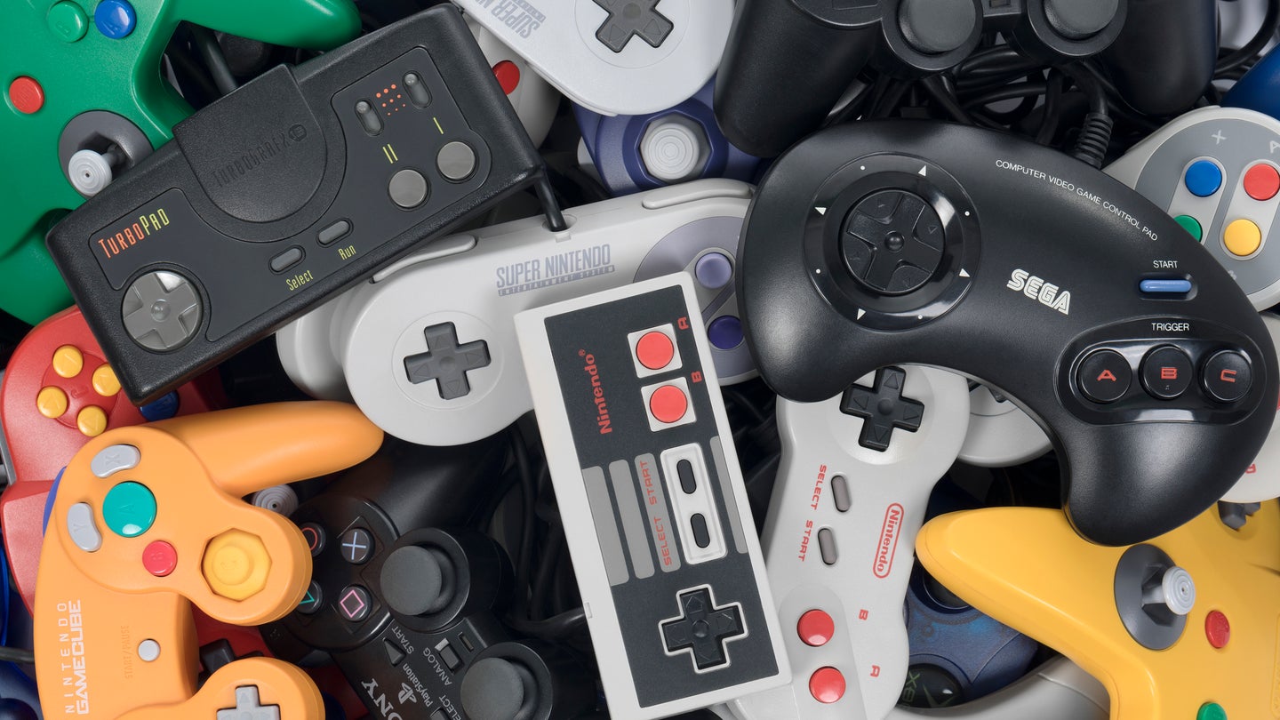 Pile of retro video game controllers
