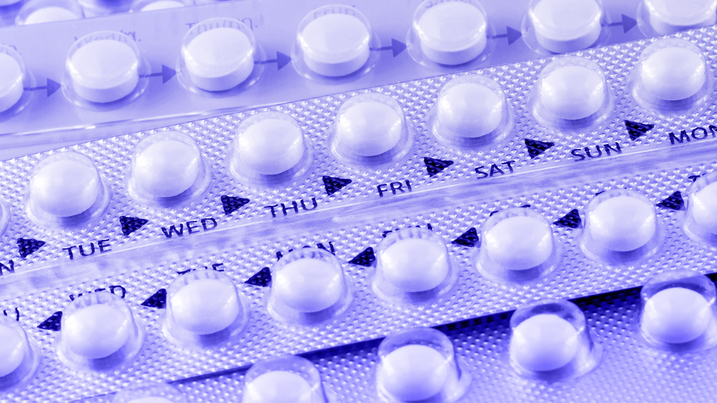 Rows of birth control pills with the days of the week on the label.