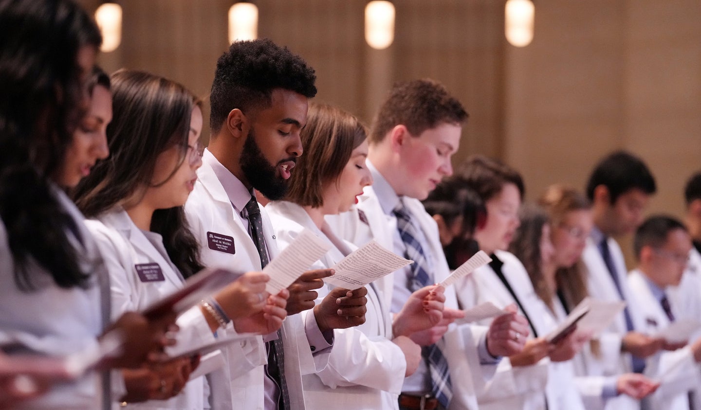 Med school students during a white coat ceremony at the University of Minnesota in 2022, before the Supreme Court decision on affirmative action in admissions
