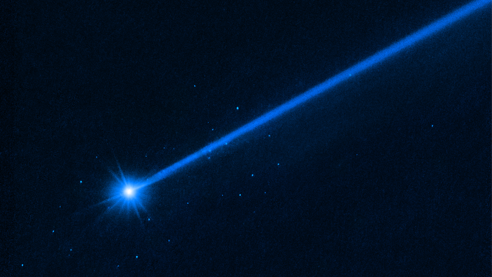 This Hubble Space Telescope image of the asteroid Dimorphos was taken on December 19, 2022, about four months after the asteroid was impacted by NASA's DART mission (Double Asteroid Redirection Test). Hubble’s sensitivity reveals a few dozen boulders knocked off the asteroid by the force of the collision. These are among the faintest objects Hubble has ever photographed inside the solar system.