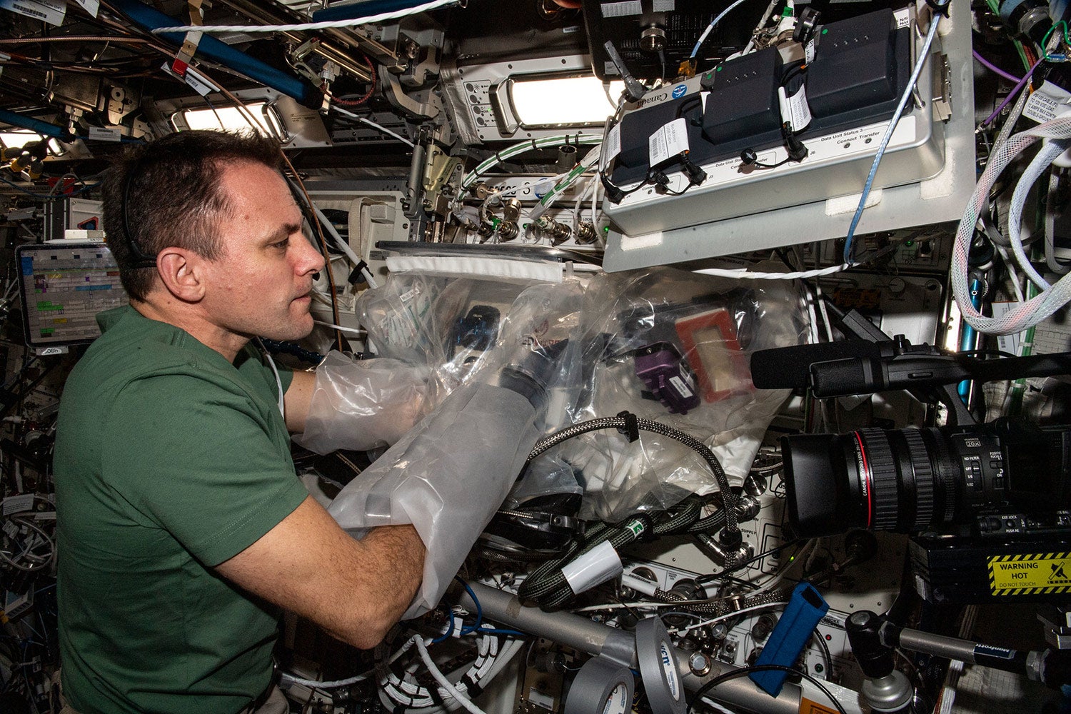 Astronaut using BFF 3D printer on ISS