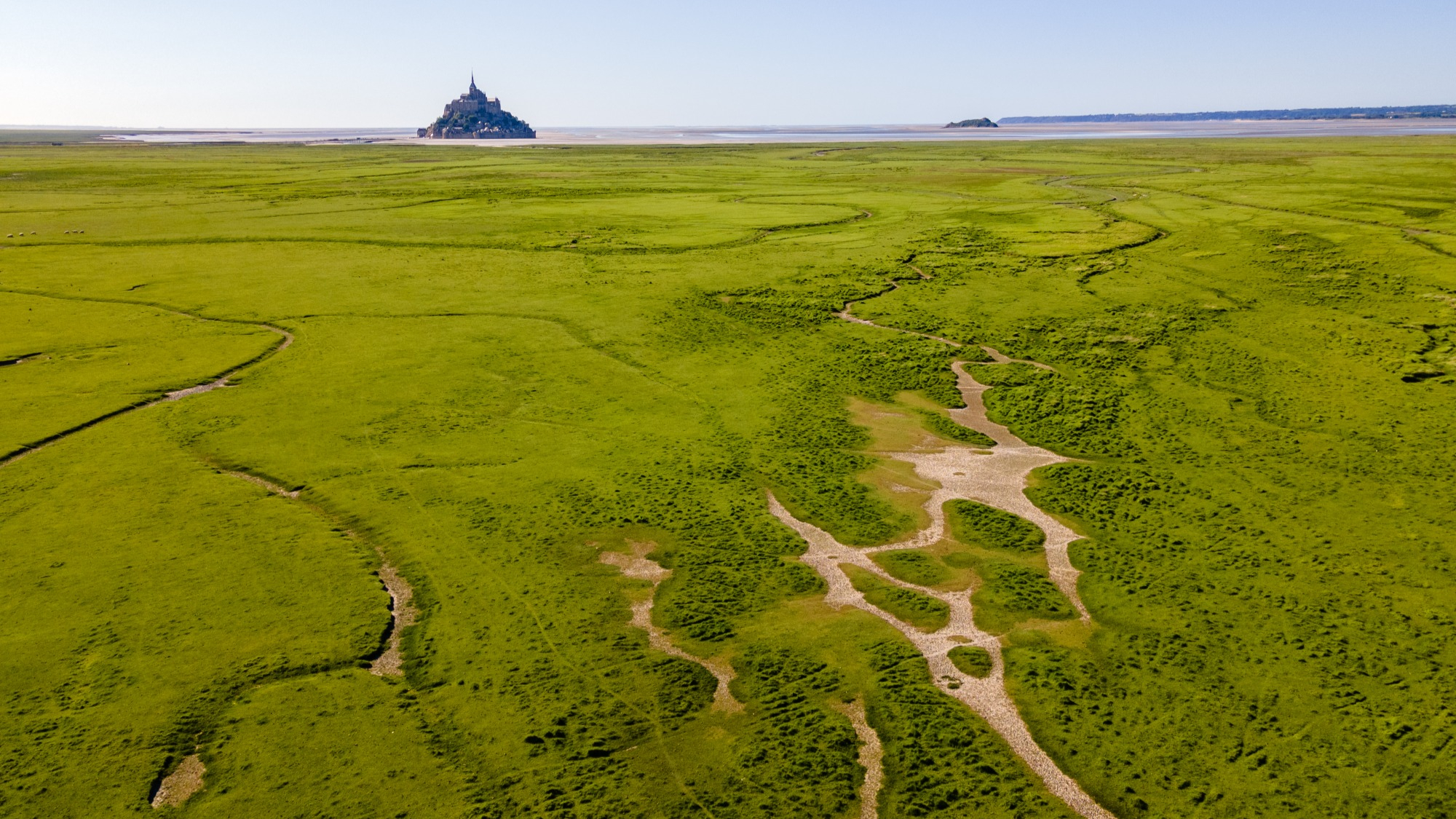 An aerial view of Mont Saint-Michel in northern France. The Paris Basin region is known for prehistoric funerary sites archaeologists use to study early neolithic settlements.