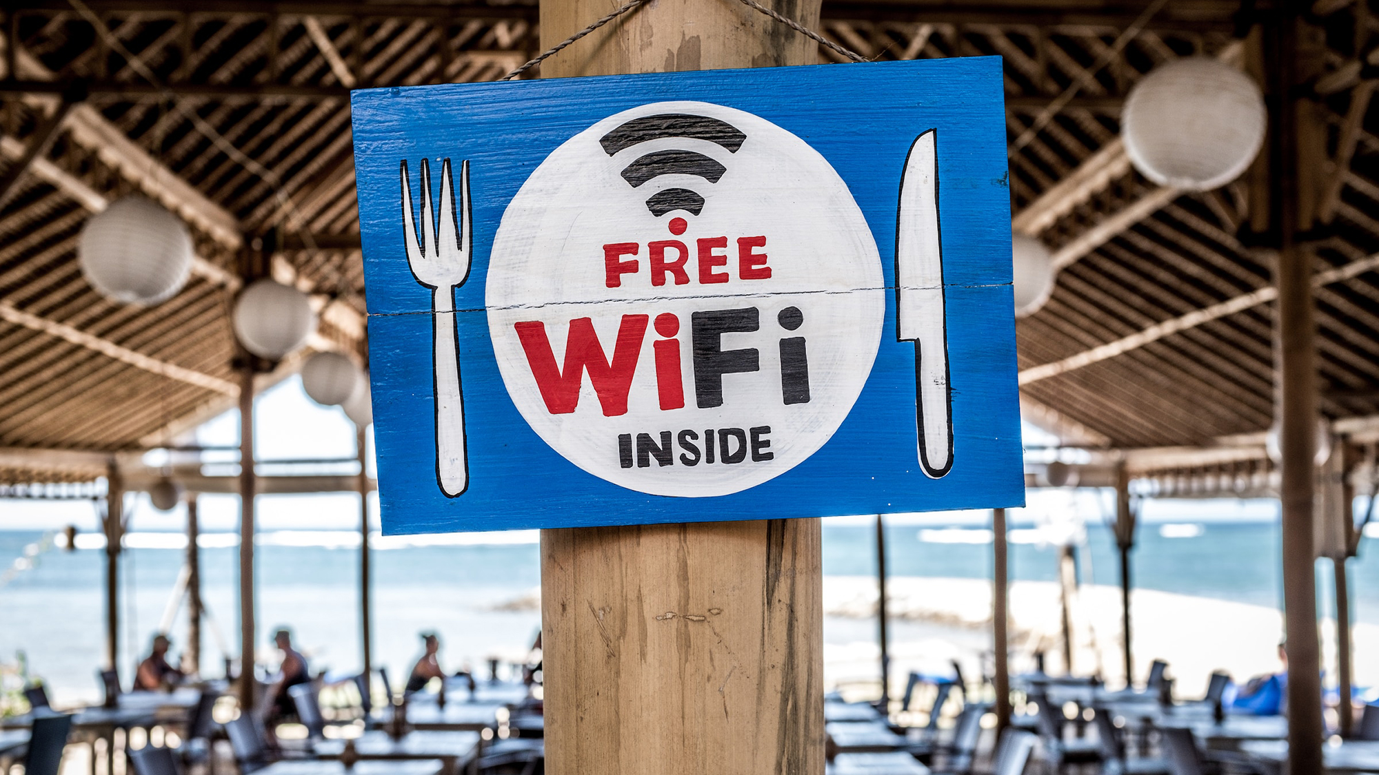 A WiFi sign in a cafe.