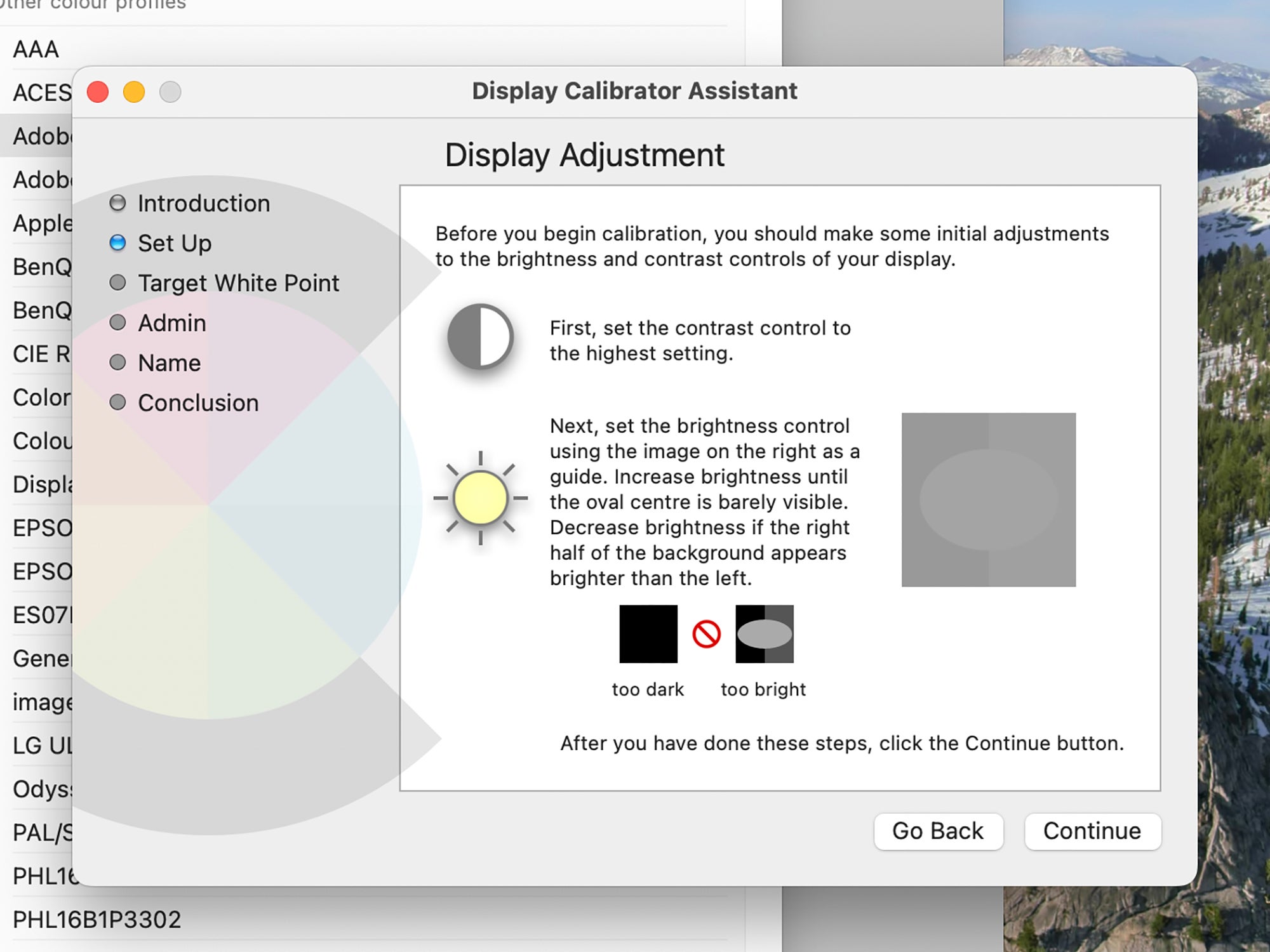 The color calibration tools on macOS, showing Display Adjustment settings.