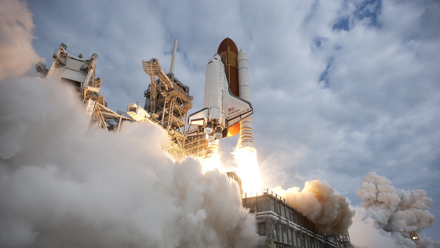 space shuttle endeavour blasts off