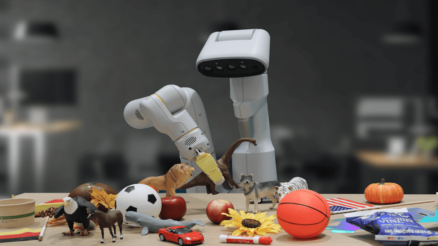 a robot starting at toy objects on table