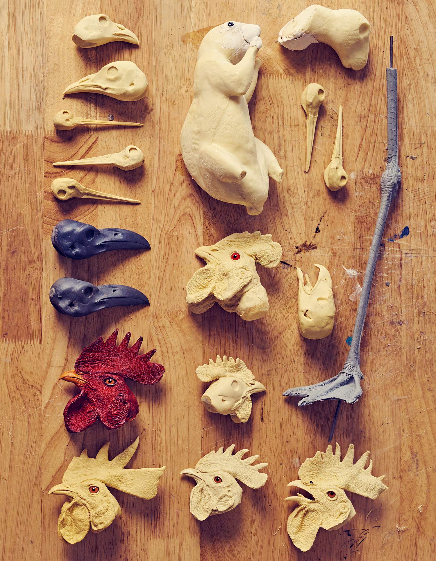 bird heads and leg, plus other animal parts made from foam