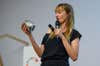 CASCAIS, PORTUGAL - SEPTEMBER 15: French blogger and writer Bea Johnson, who calls herself “Mother of the zero waste lifestyle movement”, displays a jar with her family’s trash for a year onstage while lecturing on Zero Waste Home during the last day of Eco Cascais 2019 on September 15, 2019 in Cascais, Portugal. Bea Johnson's bestseller "Zero Waste Home: The Ultimate Guide to Simplifying Your Life by Reducing Your Waste" has been printed in different languages and is currently in its Portuguese third edition. (Photo by Horacio Villalobos#Corbis/Corbis via Getty Images)