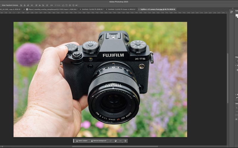 Adobe Lightroom Classic with a picture of a hand holding a fujifilm X-T3 camera in the edit window