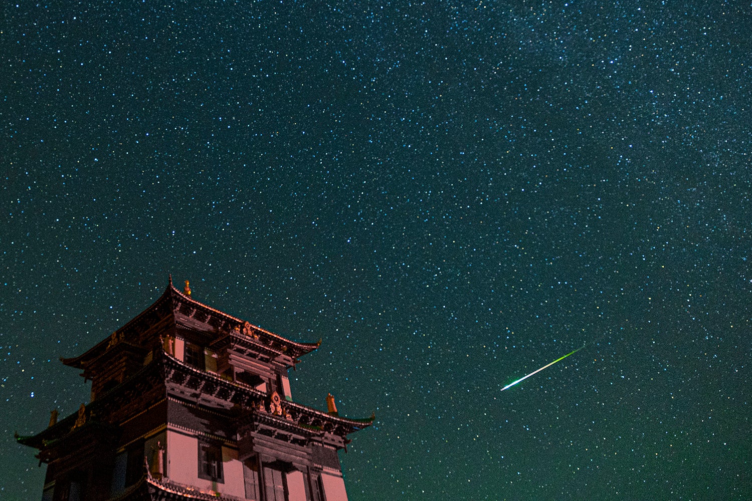 GOLOG, CHINA - AUGUST 13: A meteor streaks across the sky during the Perseid meteor shower on August 13, 2023 in Golog Tibetan Autonomous Prefecture, Qinghai Province of China. (Photo by VCG/VCG via Getty Images)