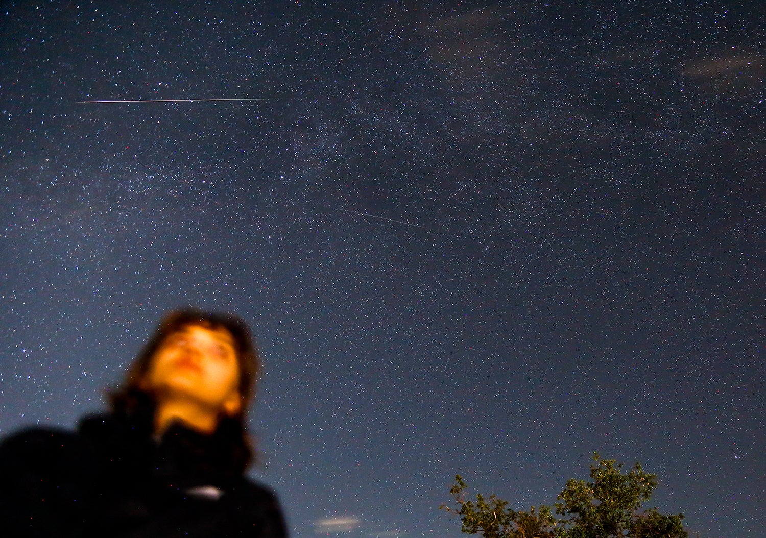 CALIFORNIA, UNITED STATES - AUGUST 13: An observer watches the Perseid meteor shower at Mount Hamilton in California, United States on August 13, 2023. (Photo by Tayfun Coskun/Anadolu Agency via Getty Images)