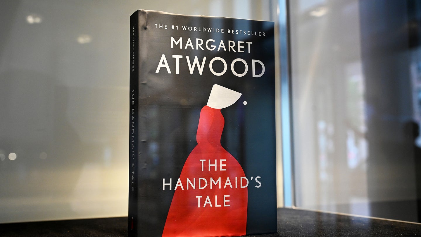 Copy of Margaret Atwood's 'The Handmaid's Tale' behind glass case