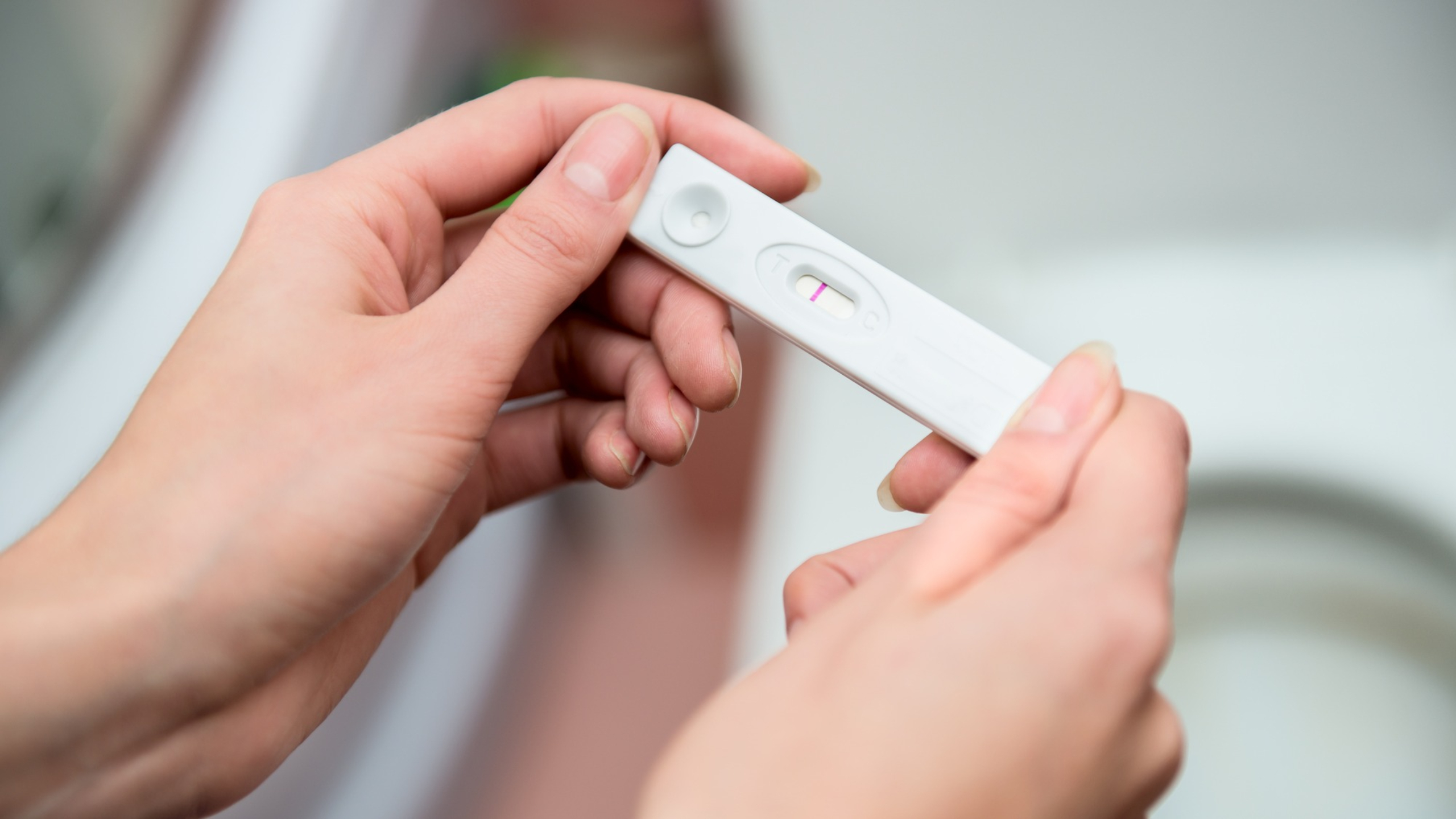 pregnancy test in hands