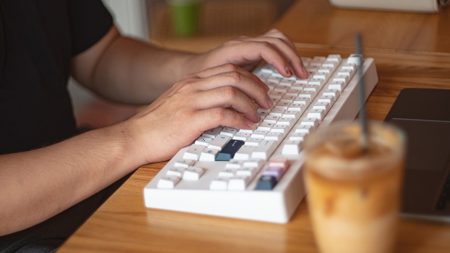 Monokei Standard keyboard on a desk typing